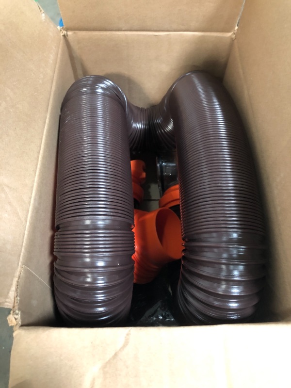 Photo 2 of Camco RhinoFLEX RV Sewer Hose Kit with Swivel Transparent Elbow and 4-in-1 Dump Station Fitting, Brown, 15 Feet (39770) 15ft Sewer Hose Kit Frustration-Free Packaging