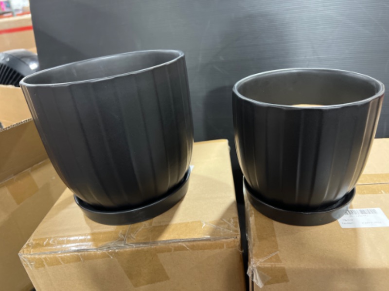 Photo 1 of Black Plant Pots set of 2. 