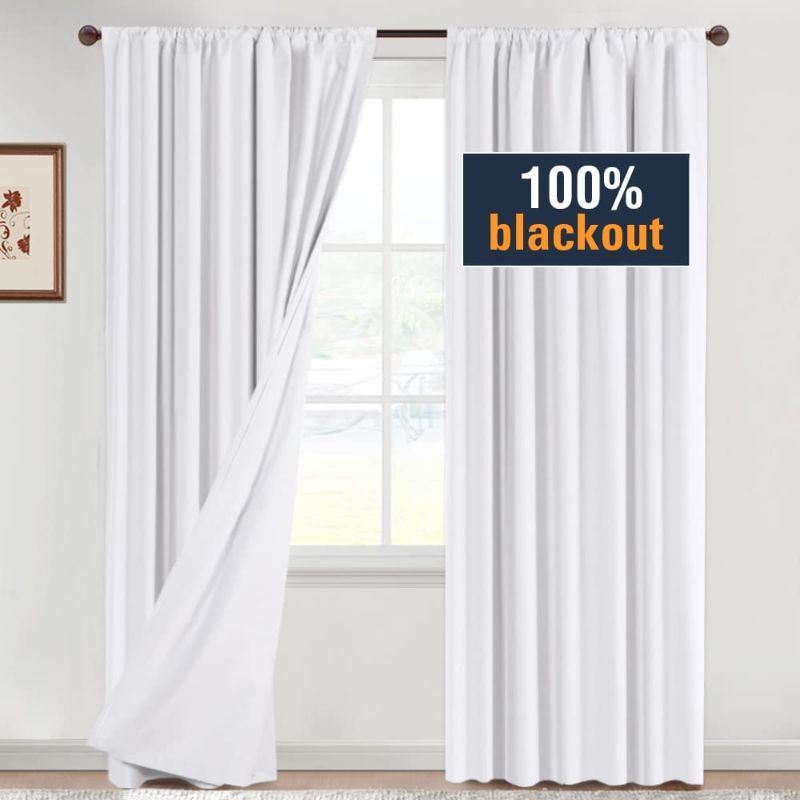 Photo 1 of Amazon Basics outdoor polyester 2 panel curtains- 42x84" [White]