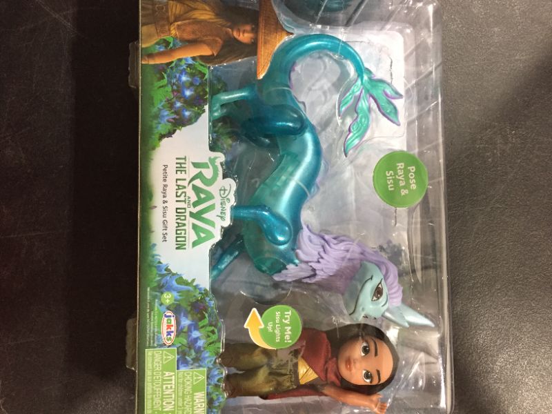 Photo 2 of Disney's Raya and the Last Dragon 6-Inch Petite Raya Doll and Feature Sisu Dragon Figure Gift Set, 6 inches
