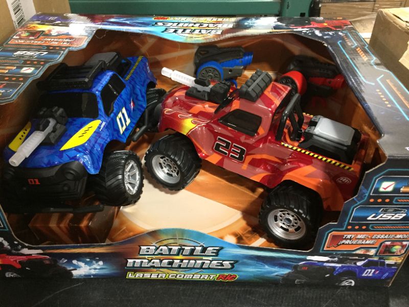 Photo 2 of Jada Toys Battle Machines 1:16 Laser Combat RC Remote Control Car 2-Pack, 2.4 GHZ Red/Blue Truck, Toys for Kids and Adults 
