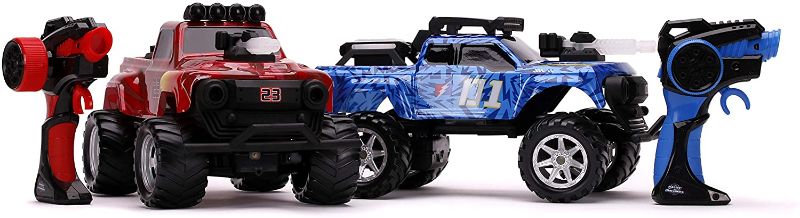 Photo 1 of Jada Toys Battle Machines 1:16 Laser Combat RC Remote Control Car 2-Pack, 2.4 GHZ Red/Blue Truck, Toys for Kids and Adults 
