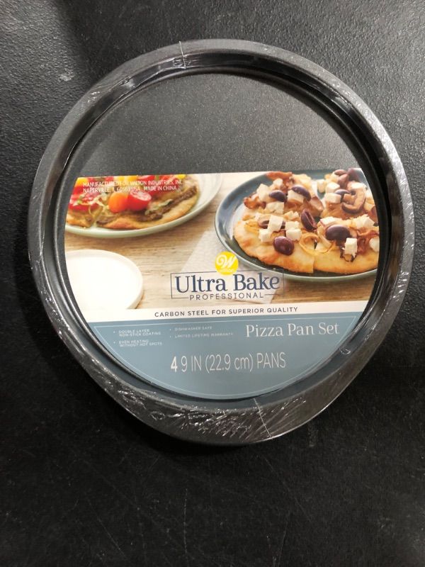 Photo 2 of Wilton 4pc Pizza Pan Set

