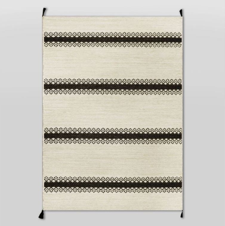 Photo 1 of 5' x 7' Outdoor Rug Argyle Stripe Black - Threshold