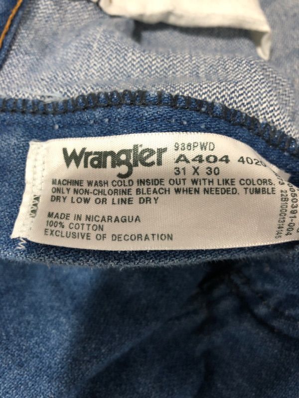 Photo 3 of MEN'S WRANGLER BLUE JEANS. SIZE 31 X 30 INCH. SOME STAINS FROM PRIOR USE.
