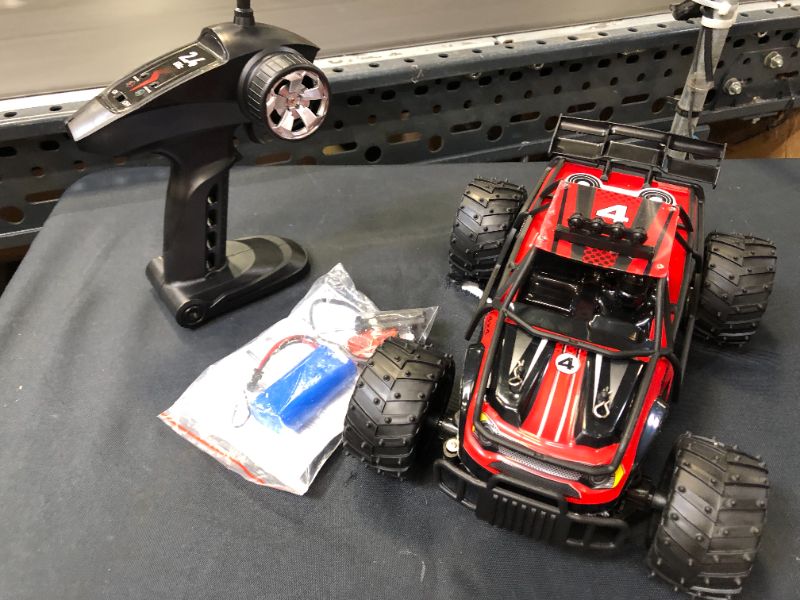 Photo 2 of BESWIT RC Cars 1:14 Remote Control Truck with Lights 4WD Offroad Hobby RC Trucks All Terrain RC Cars with 2 Rechargeable Batteries for 40 Mins Play, Fast Short Course RC Car for Adult Kid Boys Girls
