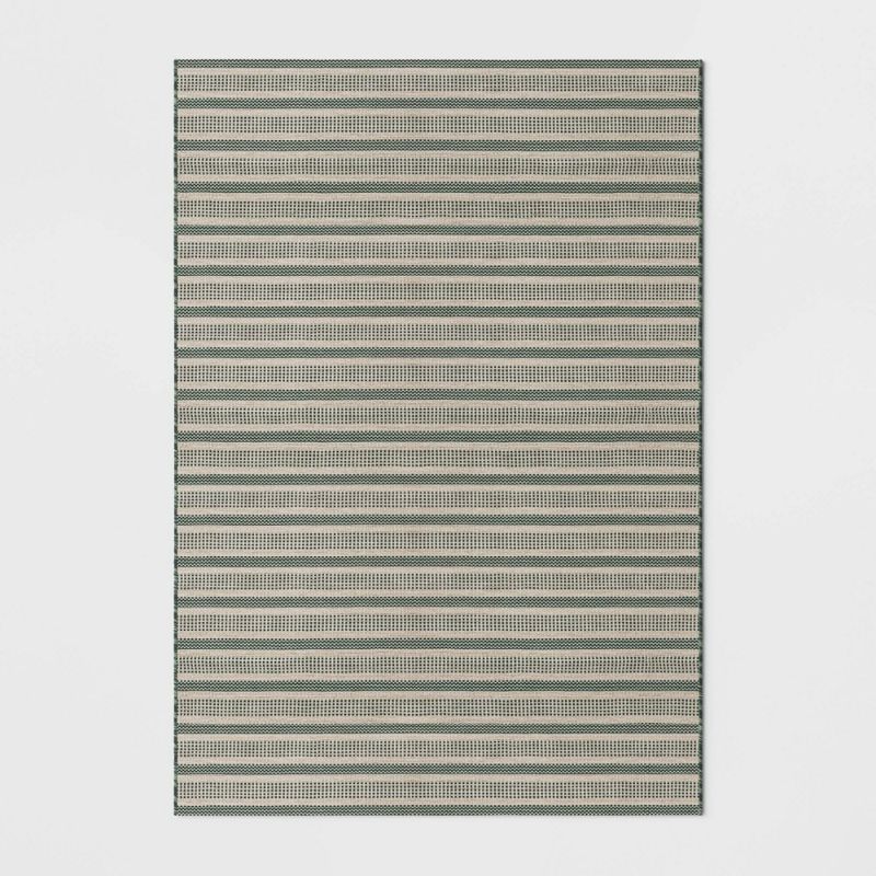 Photo 1 of 7' X 10' Powerloom Stripe Outdoor Rug Sage/Charcoal Gray - Threshold™ Designed with Studio McGee
