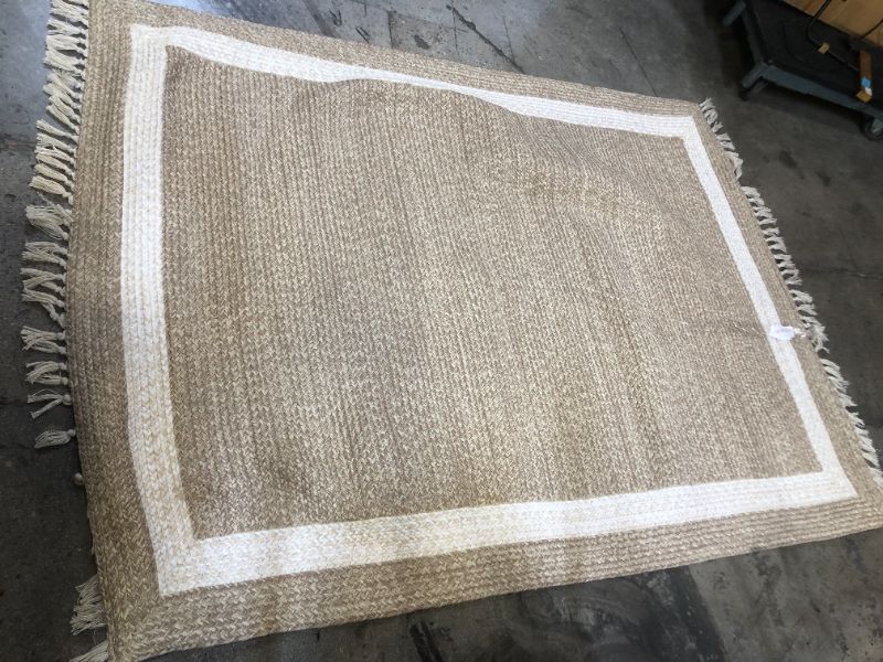 Photo 2 of Braided Outdoor Rug with Fringe Neutral/Ivory  5'x7'----dirty item