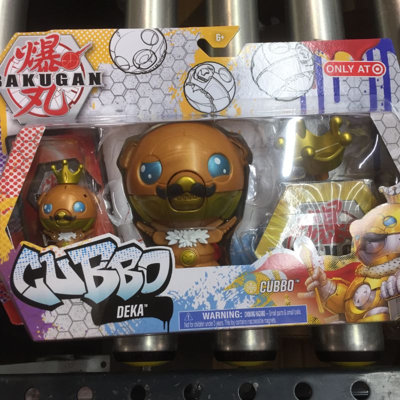 Photo 2 of Bakugan 2021 Gold King Cubbo Deka Pack Jumbo Collectible Transforming Figure with King Cubbo 2-inch Core Figure and Trading Cards
