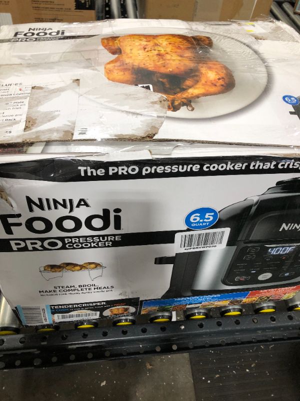 Photo 3 of Ninja FD302 Foodi 11-in-1 Pro 6.5 qt. Pressure Cooker & Air Fryer that Steams, Slow Cooks, Sears, Sautés, Dehydrates & More, with 4.6 qt. Crisper Plate, Nesting Broil Rack & Recipe Book, Silver/Black
