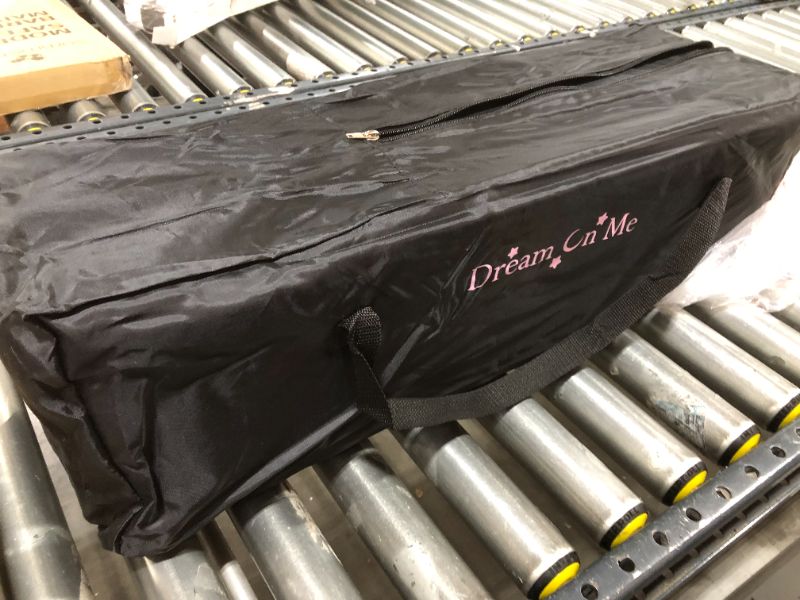 Photo 1 of Dream On Me Nest Portable Play Yard with Carry Bag and Shoulder Strap, Pink
