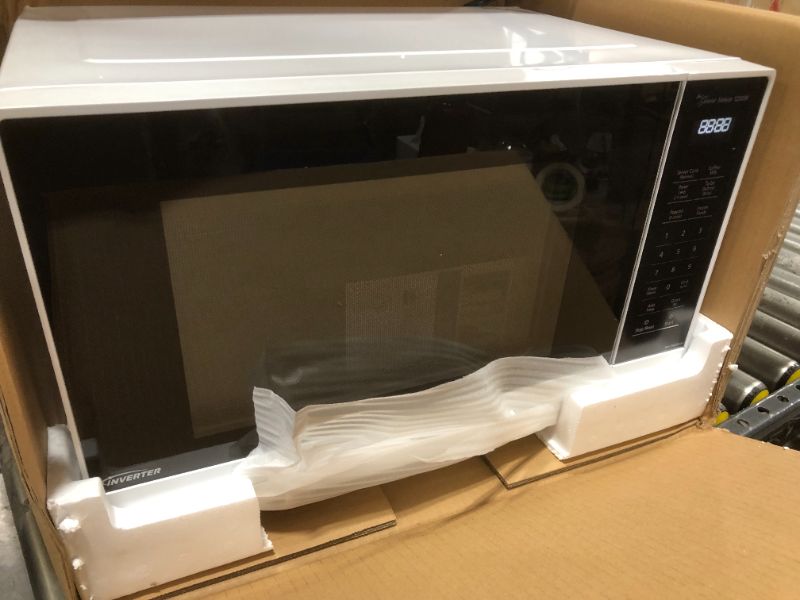 Photo 2 of Panasonic - 1.2 Cu. Ft. 1200 Watt SN65KW Microwave with Genius Sensor Cooking - White
