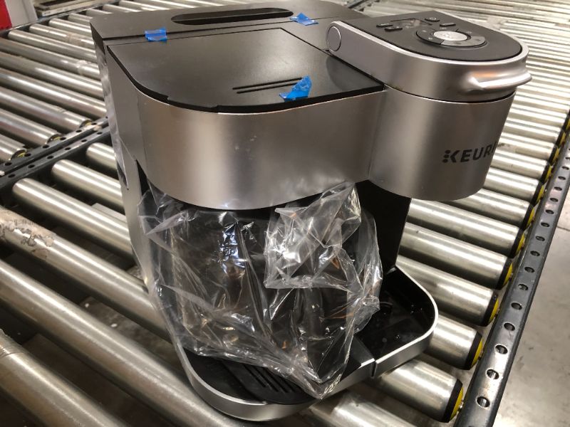 Photo 1 of Keurig K-Duo Special Edition Coffee Maker, Single Serve and 12-Cup Drip Coffee Brewer, Compatible with K-Cup Pods and Ground Coffee, Silver
