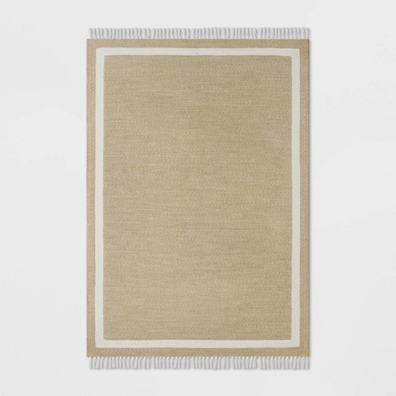 Photo 1 of 7' X 10' Braided Outdoor Rug with Fringe Neutral/Ivory - Threshold™ Designed with Studio McGee
