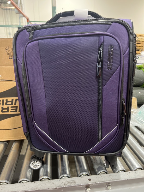 Photo 2 of American Tourister Zoom Turbo Softside Expandable Spinner Wheel Luggage, Purple, Carry-on 20-Inch
