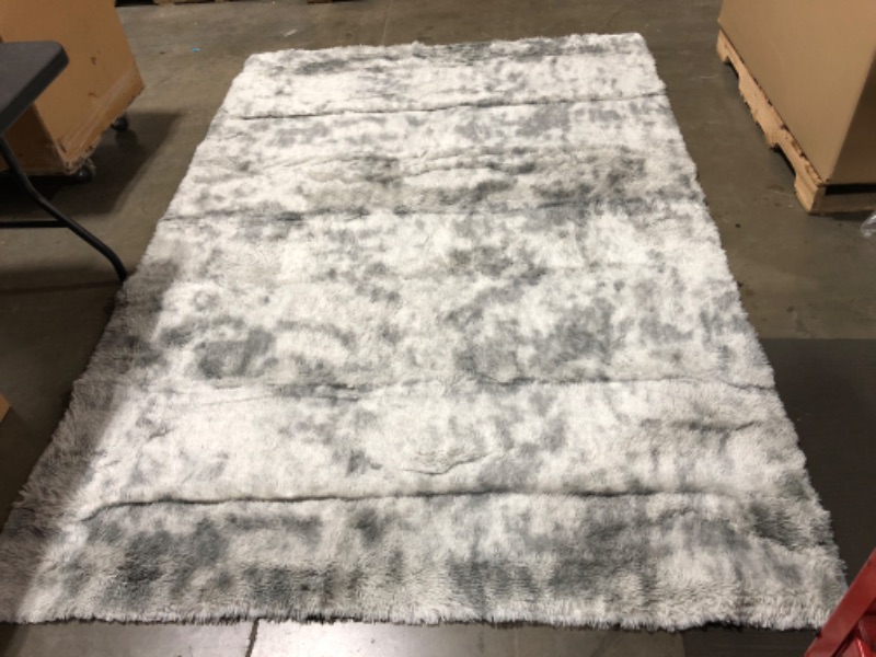 Photo 1 of 6ft x 9ft area rug--- grey 