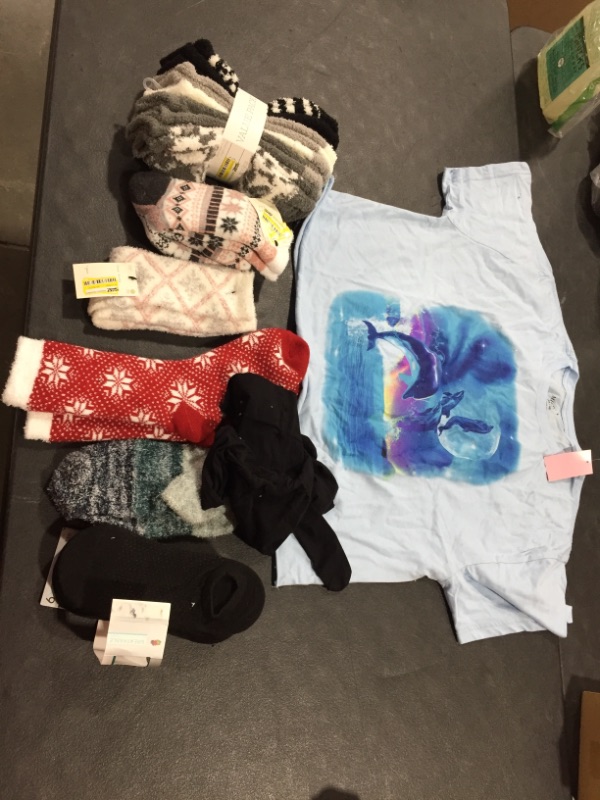 Photo 1 of Assorted socks and shirt