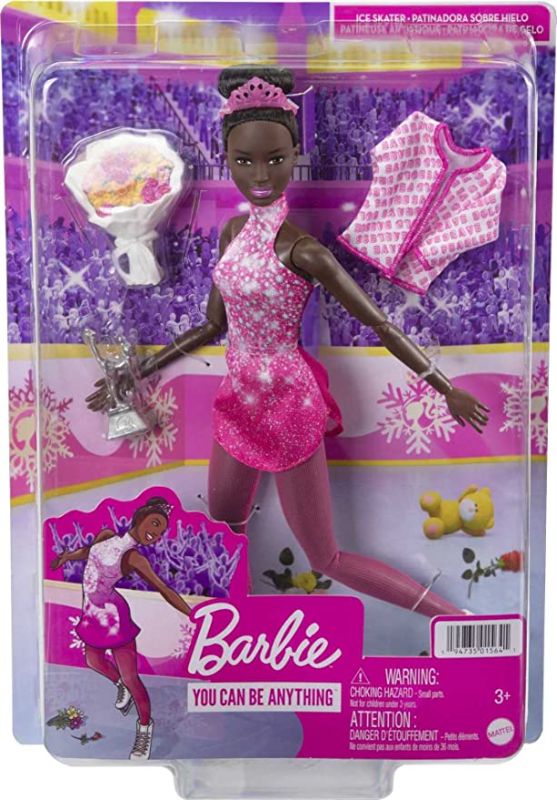 Photo 1 of Barbie Winter Sports Ice Skater Brunette Doll (12 Inches) with Pink Dress, Jacket, Rose Bouquet & Trophy, Great Gift for Ages 3 and Up
