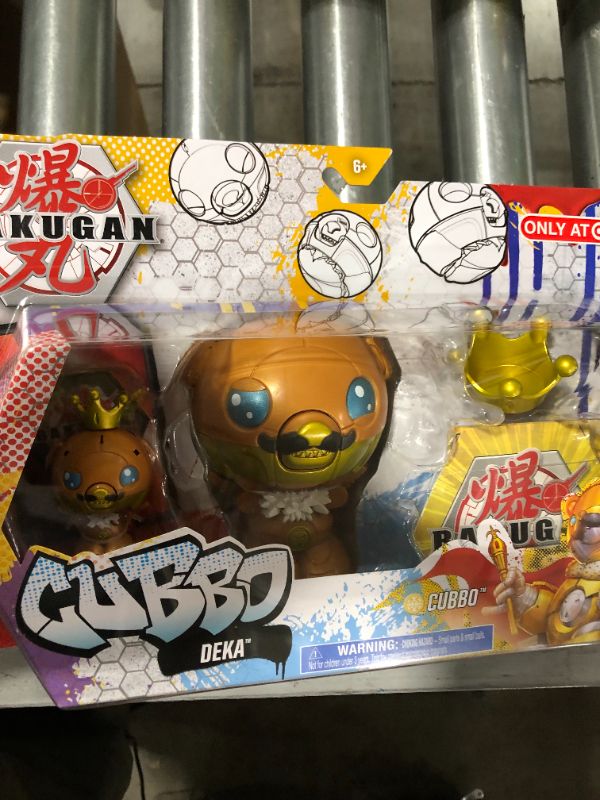 Photo 2 of Bakugan 2021 Gold King Cubbo Deka Pack Jumbo Collectible Transforming Figure with King Cubbo 2-inch Core Figure and Trading Cards
