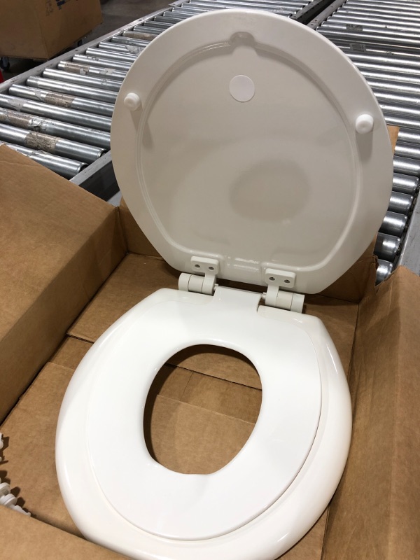 Photo 4 of Ginsey Home Solutions Ginsey Adult & Child Wood Plastic Potty Ring & EZ-Off Hinges Round Toilet Seat, Other. CHIPPED PAINT. OPEN PACKAGE.
