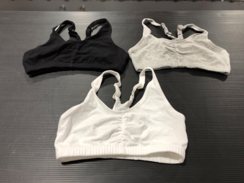 Photo 1 of WOMEN'S FRUIT OF THE LOOM SPORTS BRAS, SET OF 3. SIZE 32. PRIOR USE.