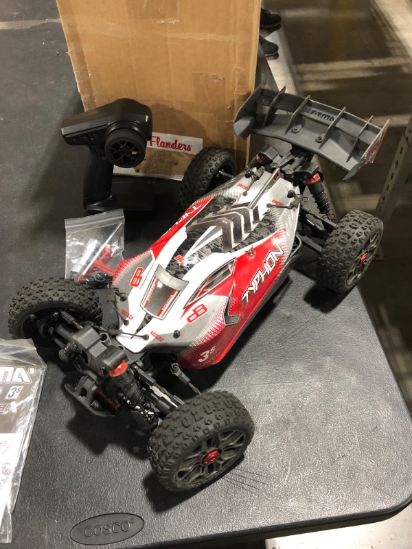 Photo 2 of ARRMA 1/8 Typhon 4X4 V3 3S BLX Brushless Buggy RC Truck RTR (Transmitter and Receiver Included, Batteries and Charger Required), Red, ARA4306V3
