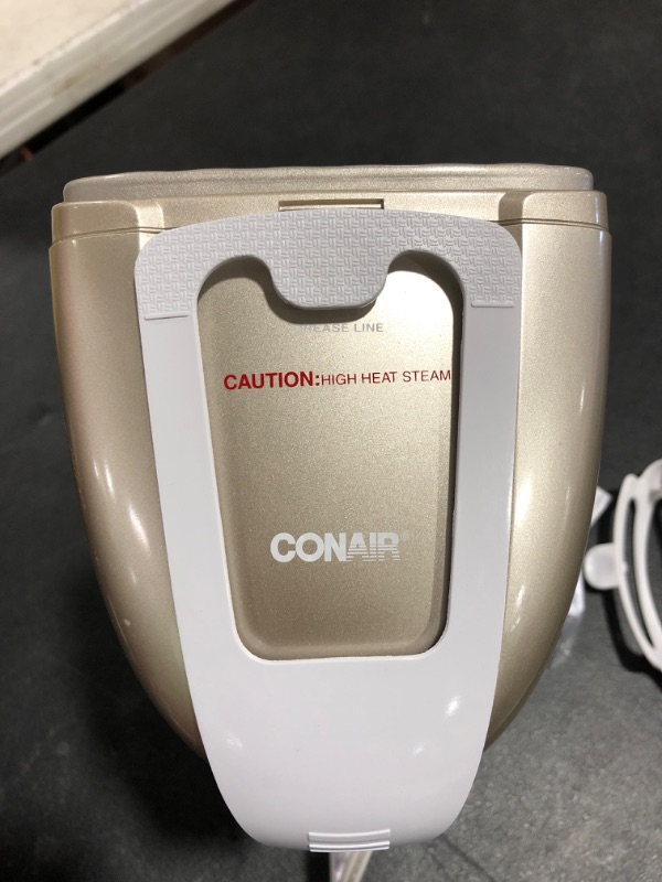 Photo 4 of Conair Turbo Extreme Steam Hand Held Fabric Steamer, White/Champagne, One Size
PRIOR USE. MISSING BOX.