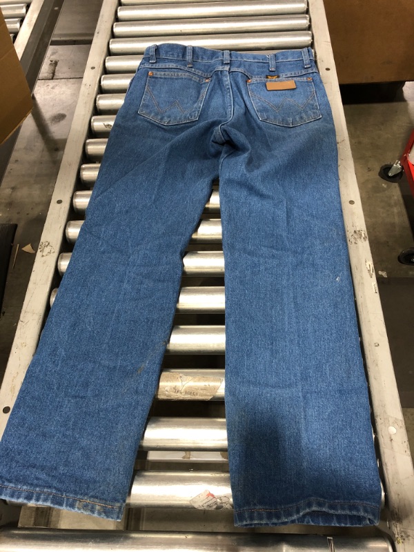 Photo 4 of MEN'S WRANGLER BLUE JEANS. SIZE 31 X 30 INCH. SOME STAINS FROM PRIOR USE. 