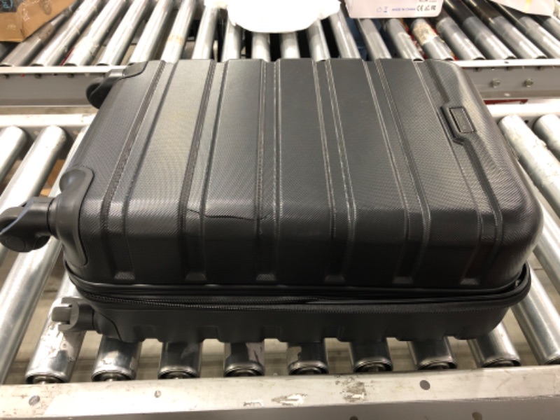 Photo 3 of Wrangler Hardside Carry-On Spinner Luggage, Black, 20-Inch. CRACKED OUTER SHELL. PRIOR USE.
