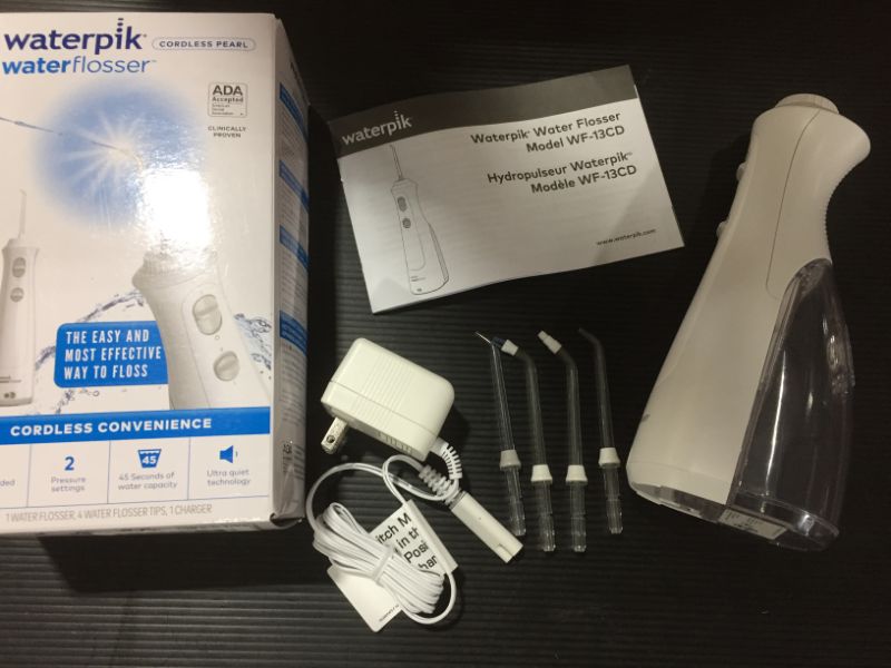 Photo 2 of Waterpik Cordless Pearl Rechargeable Portable Water Flosser for Teeth, Gums, Braces Care and Travel with 4 Flossing Tips, ADA Accepted, WF-13 White
