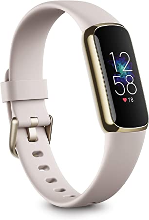 Photo 1 of Fitbit Luxe Fitness and Wellness Tracker with Stress Management, Sleep Tracking and 24/7 Heart Rate, One Size S L Bands Included, Lunar White/Soft Gold Stainless Steel, 1 Count
