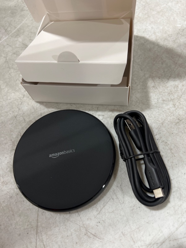 Photo 2 of Amazon Basics 15W Qi Certified Wireless Charging Pad (No AC Adapter)
