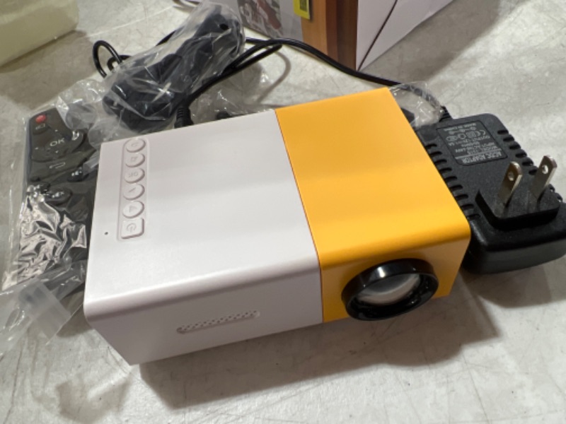 Photo 2 of Dartwood Mini Projector with Support for HDMI, USB, and Memory SD - Compatible with Smartphones