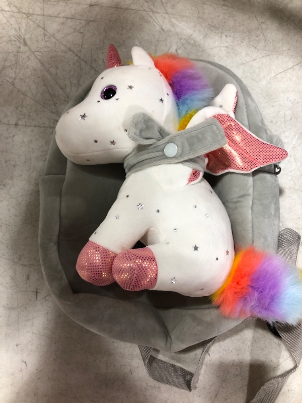 Photo 1 of grey toddler backpack with unicorn plushie