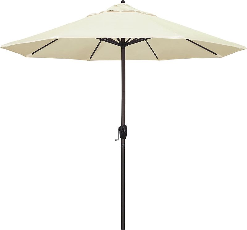 Photo 1 of California Umbrella 9' Round Aluminum Market Umbrella, Crank Lift, Auto Tilt, Bronze Pole, Sunbrella Canvas Fabric
