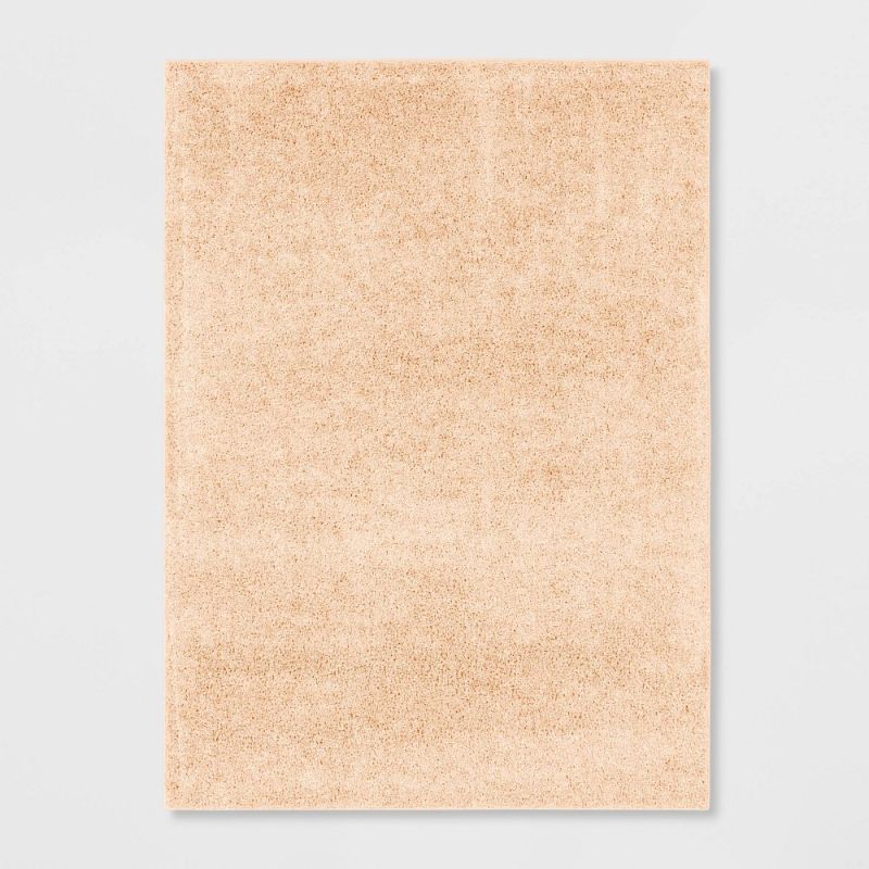 Photo 1 of 4'x5'6" Shag Rug in Blush - Room Essentials