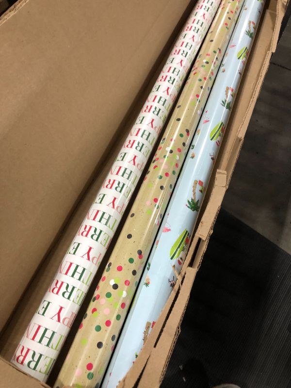 Photo 1 of Hallmark Beach Christmas Wrapping Paper with Cutlines and Optional DIY Bow Templates on Reverse (3 Rolls: 120 Sq. Ft. Ttl) Tropical Santa Claus, Pink Flamingo, Lime Green Confetti