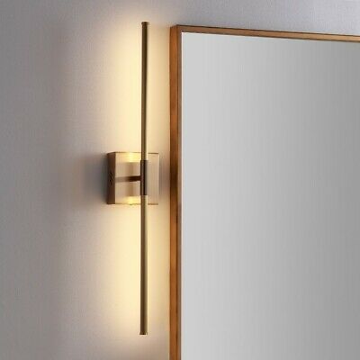 Photo 1 of Makena 28" Dimmable Integrated LED Metal Wall Sconce, Gold
