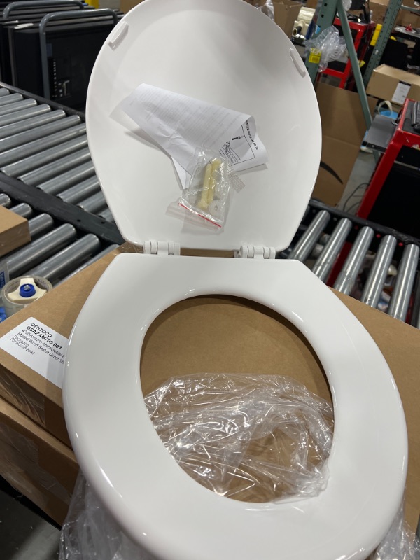 Photo 3 of Centoco Round Wood Core Toilet Seat, White
