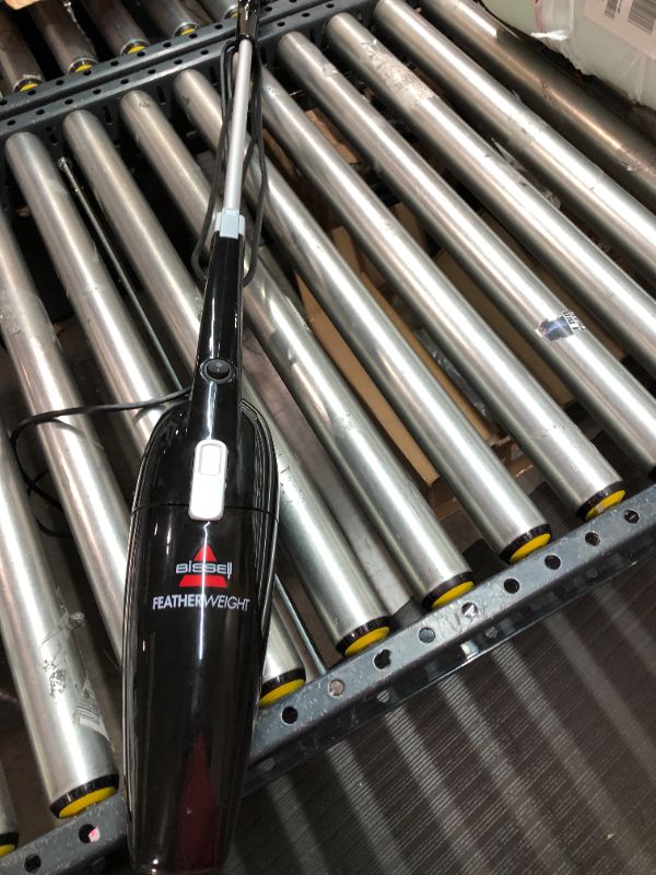 Photo 1 of BISSELL Featherweight Stick Lightweight Bagless Vacuum with Crevice Tool, 2033M, Black
