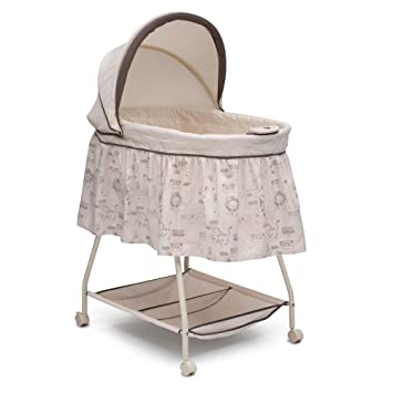 Photo 1 of Delta Children Deluxe Sweet Beginnings Bedside Bassinet - Portable Crib with Lights and Sounds, Playtime Jungle
