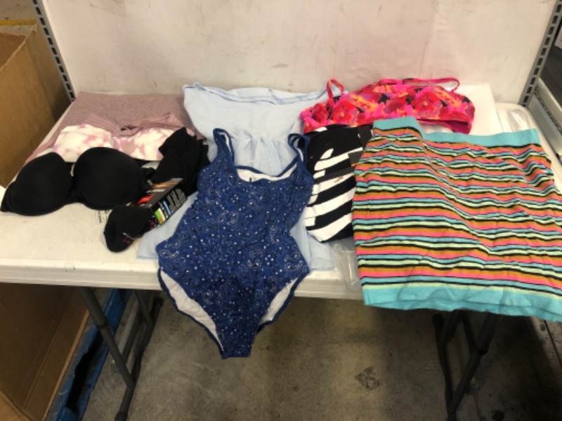 Photo 1 of BAG LOT, ASSORTED KIDS' AND ADULT CLOTHING BUNDLE, VARIOUS SIZES AND COLORS, CLOTHING SOLD AS IS