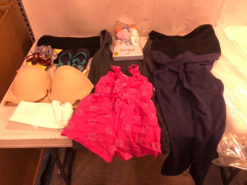 Photo 1 of BAG LOT, ASSORTED KIDS' AND ADULT CLOTHING BUNDLE, VARIOUS SIZES AND COLORS, CLOTHING SOLD AS IS