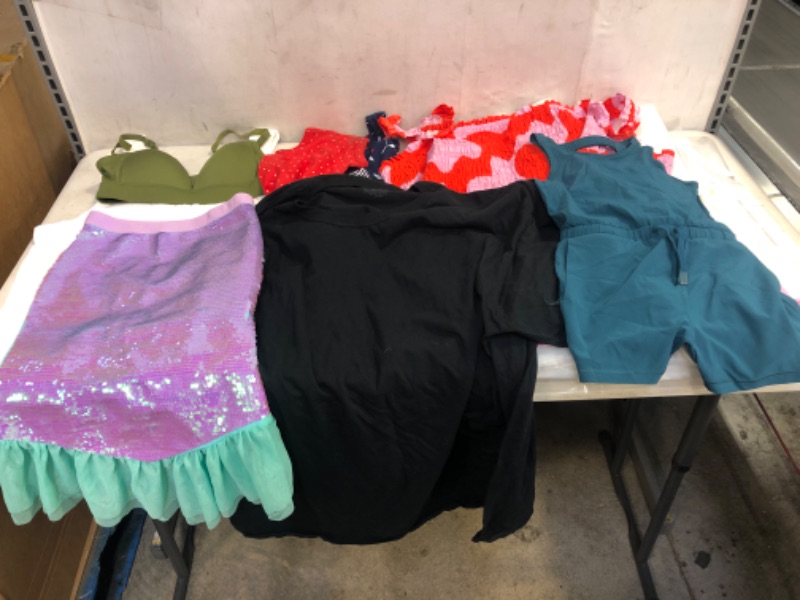 Photo 1 of BAG LOT, ASSORTED KIDS' AND ADULT CLOTHING BUNDLE, VARIOUS SIZES AND COLORS, CLOTHING SOLD AS IS