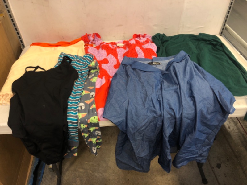 Photo 1 of BAG LOT, ASSORTED KIDS' AND ADULT CLOTHING BUNDLE, VARIOUS SIZES AND COLORS, CLOTHING SOLD AS IS