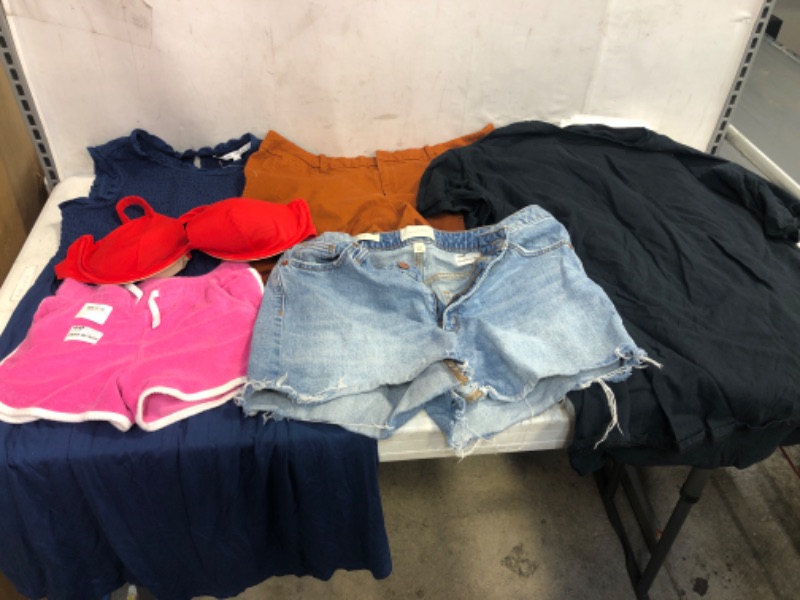 Photo 1 of BAG LOT, ASSORTED KIDS' AND ADULT CLOTHING BUNDLE, VARIOUS SIZES AND COLORS, CLOTHING SOLD AS IS