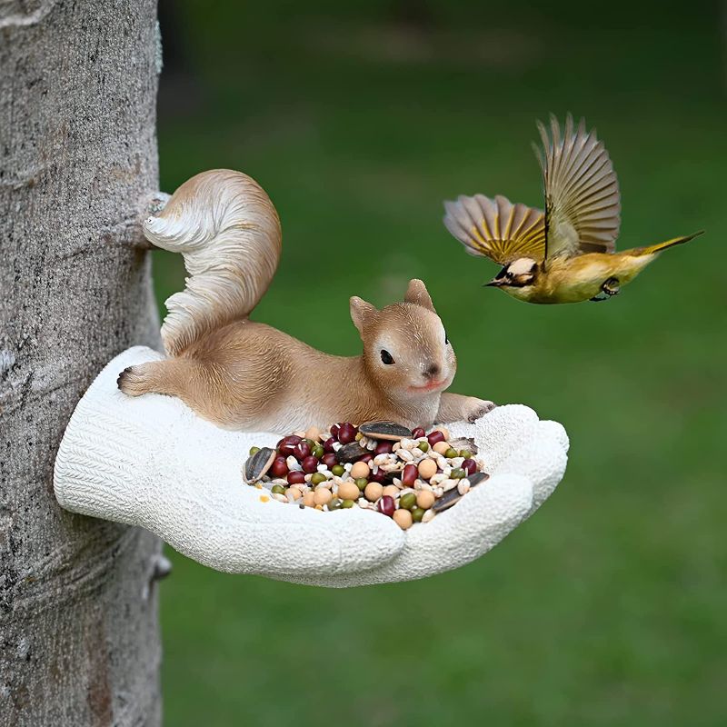 Photo 1 of ALLADINBOX Squirrel Bird Feeder Tree Decor, Unique Design Squirrel Lie on Hand, Hanging Garden Statues, Wild Seed Birdfeeder Tree Hugger Sculpture, Whimsical Garden Decorations, Outdoor Yard Art
