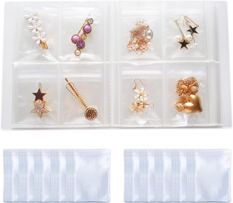 Photo 1 of Aranray Transparent Jewelry Storage Book with Pockets Transparent Jewelry Organizer Book Plastic Holders Bags for Rings Necklace Bracelets Studs Earrings (160 Grids + 100pcs Ziplock Bags) -- FACTORY SEALED 
