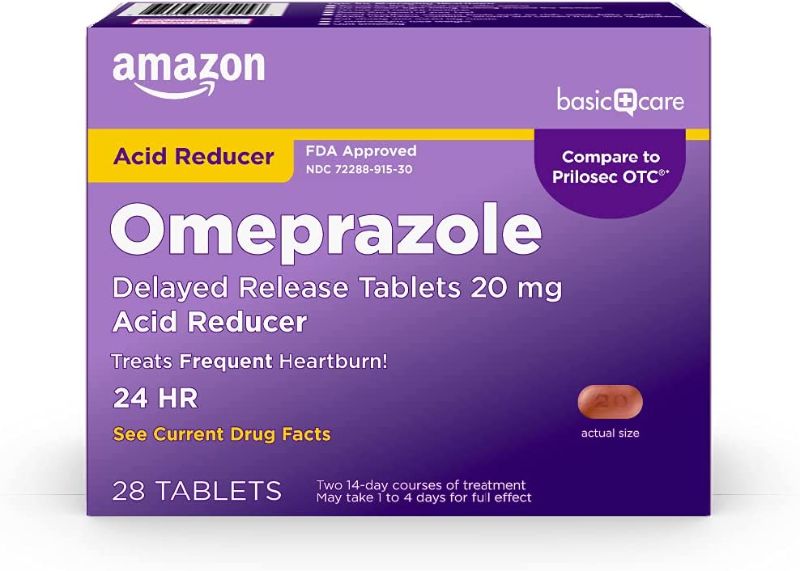 Photo 1 of Amazon Basic Care Omeprazole Delayed Release Tablets 20 Mg, ACID REDUCER  28 Count EX: 04/2023 
-- FACTORY SEALED--
