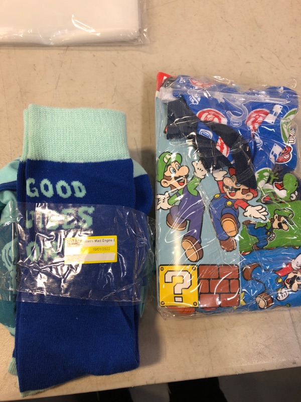 Photo 1 of BOYS BOXER AND SOCK BUNDLE SIZE 6 AND SMALL OPENED PACKAGING